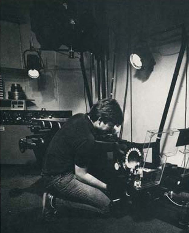 Supervising Cameraman Bob Roach adjusting the Oxberry projector at Camera Effects, Wardour Street, 1982