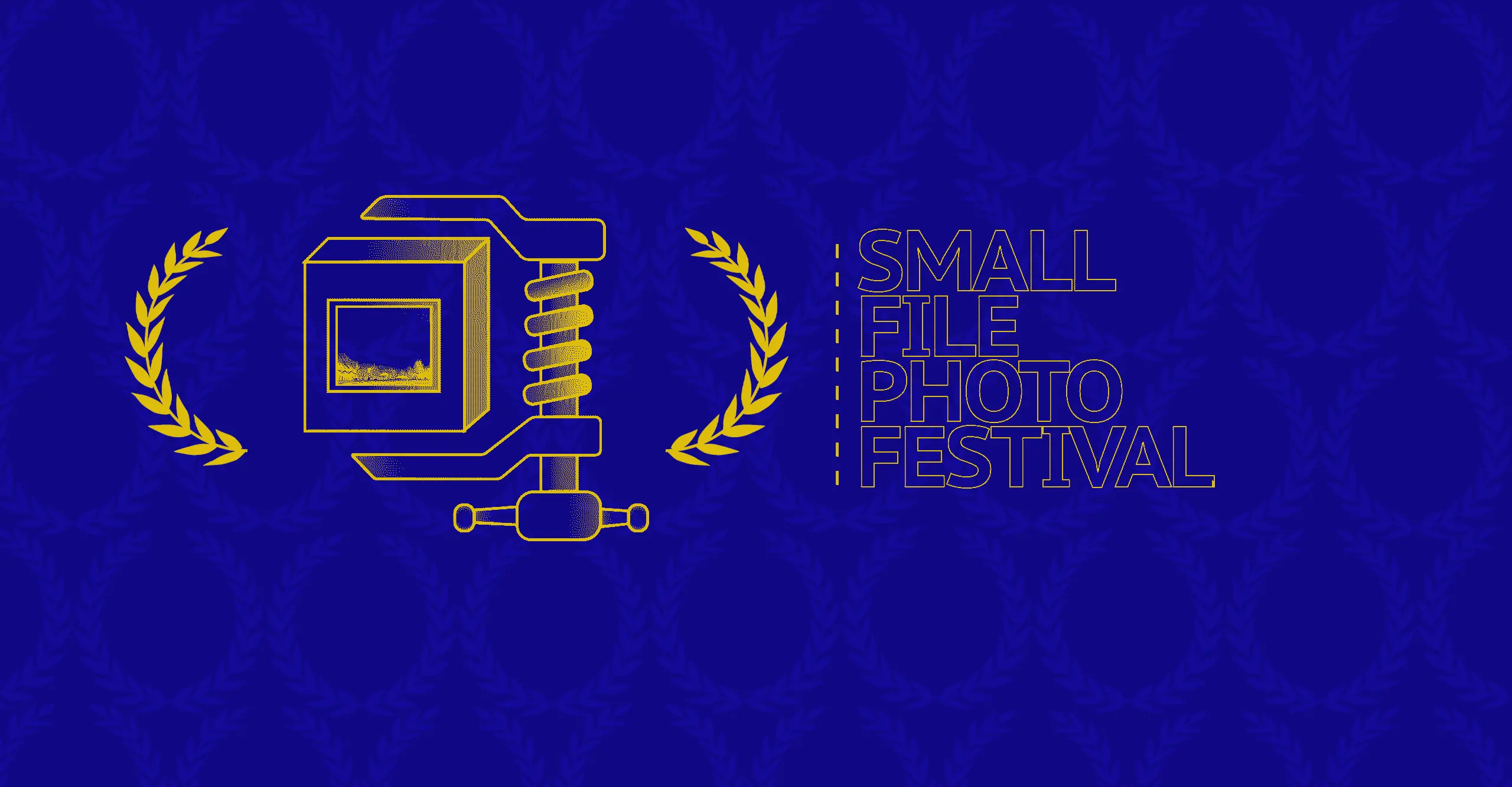 A clamp holding box that contains a photograph of landscape. "Small File Photo Festival" surrounded by award laurels