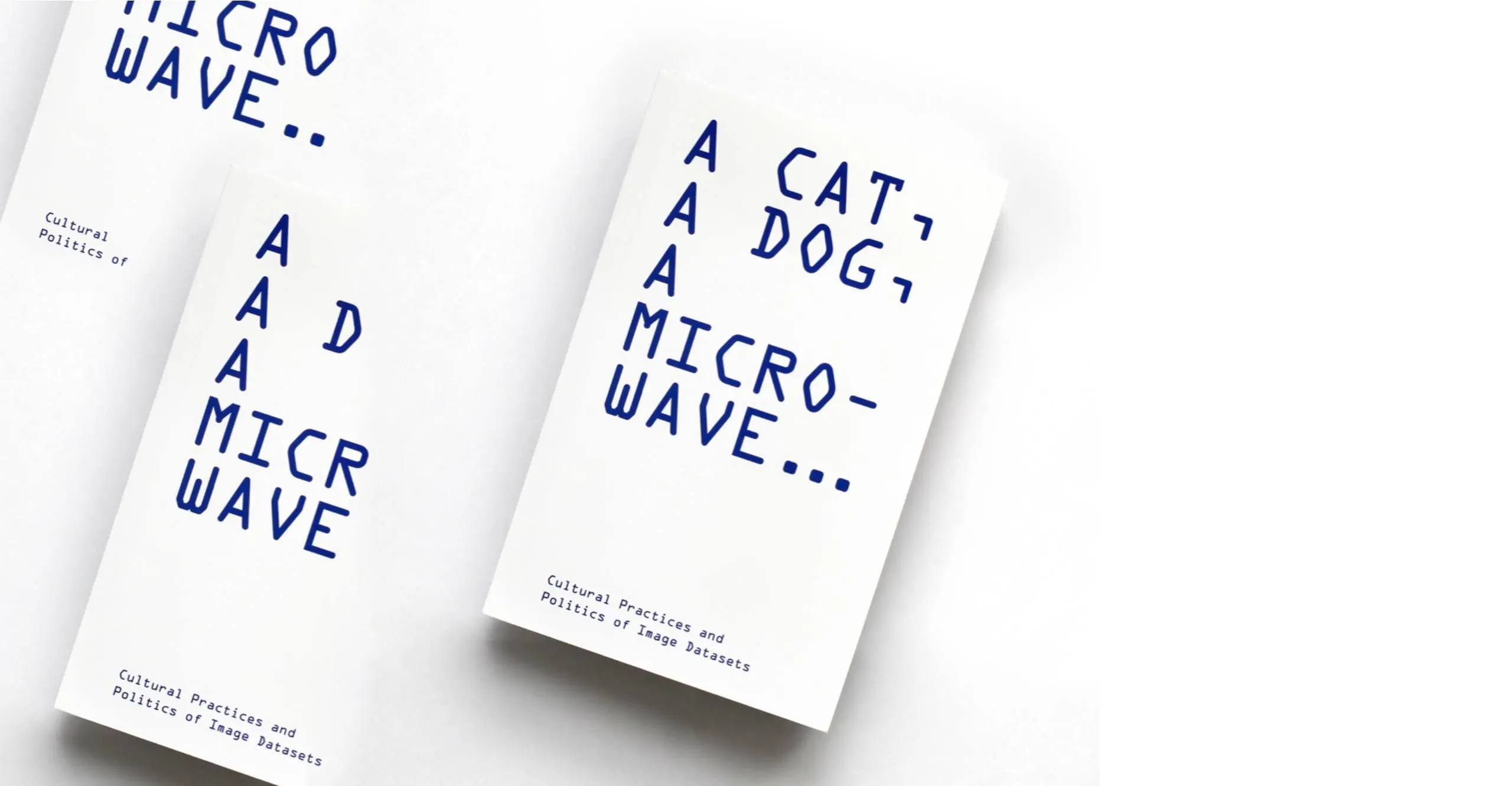 A book with the title 'A Cat, A Dog, A microwave'