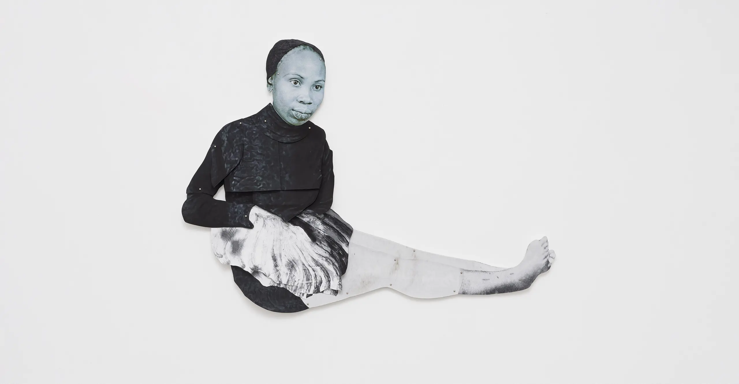 Collage image of a Black woman sitting down by Frida Orupabo at the photographers gallery