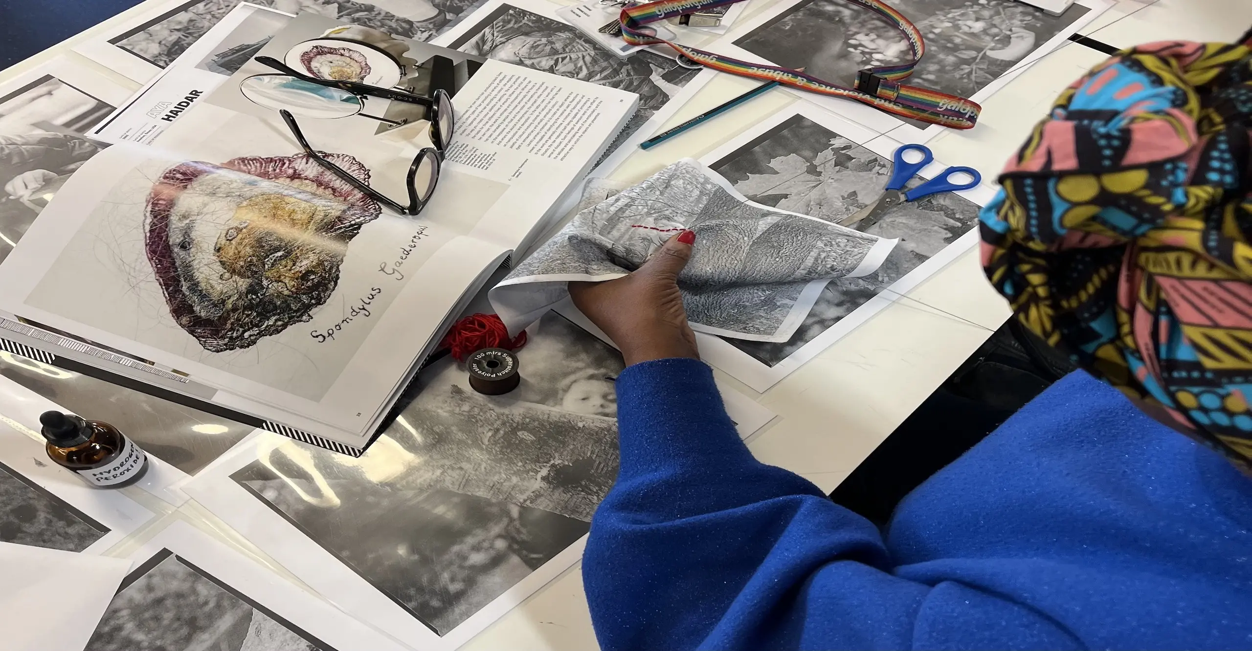 photograph of someone making a craft.