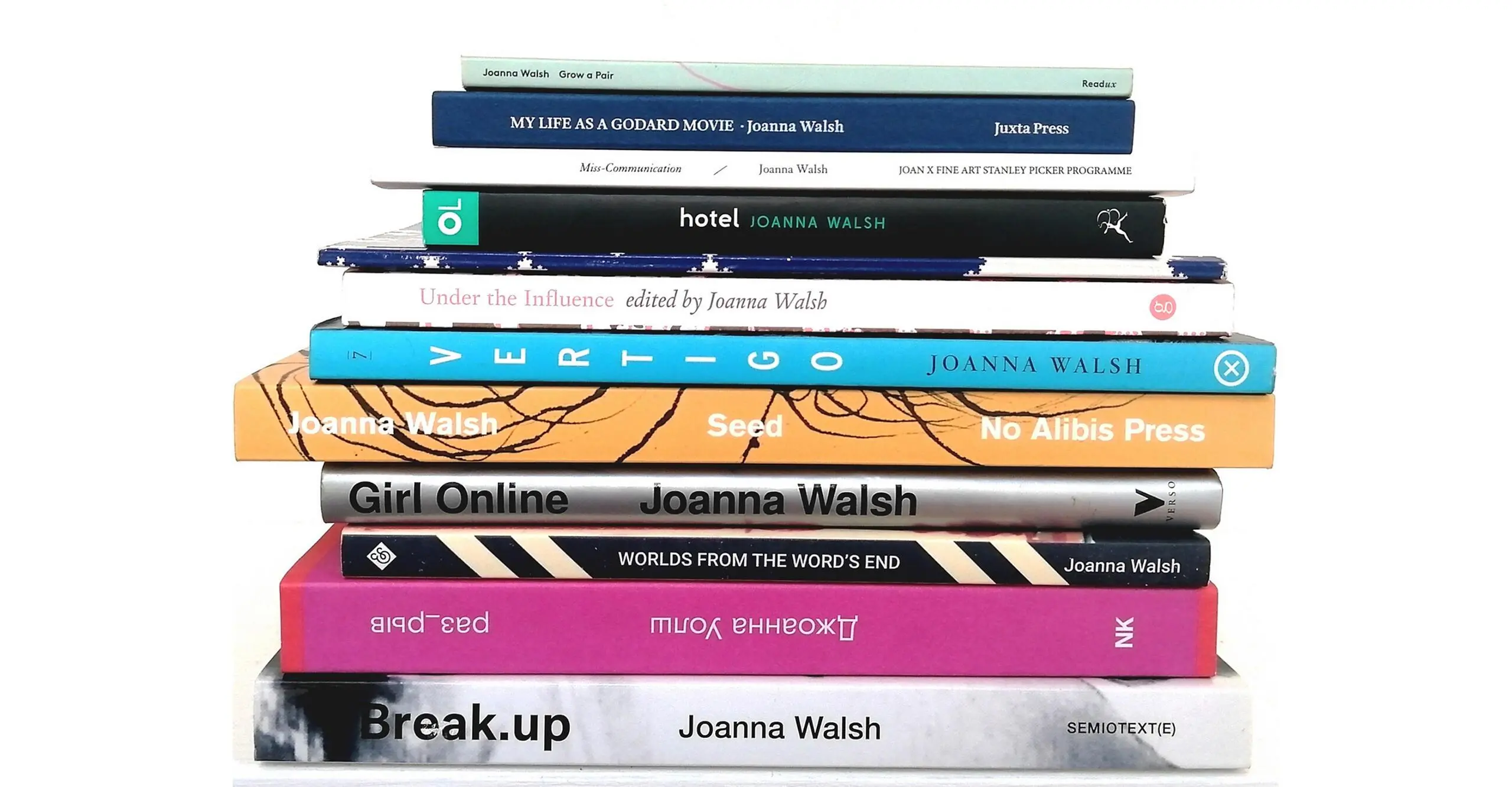 A colour image of a stack of book spines, all written by Joanna Walsh