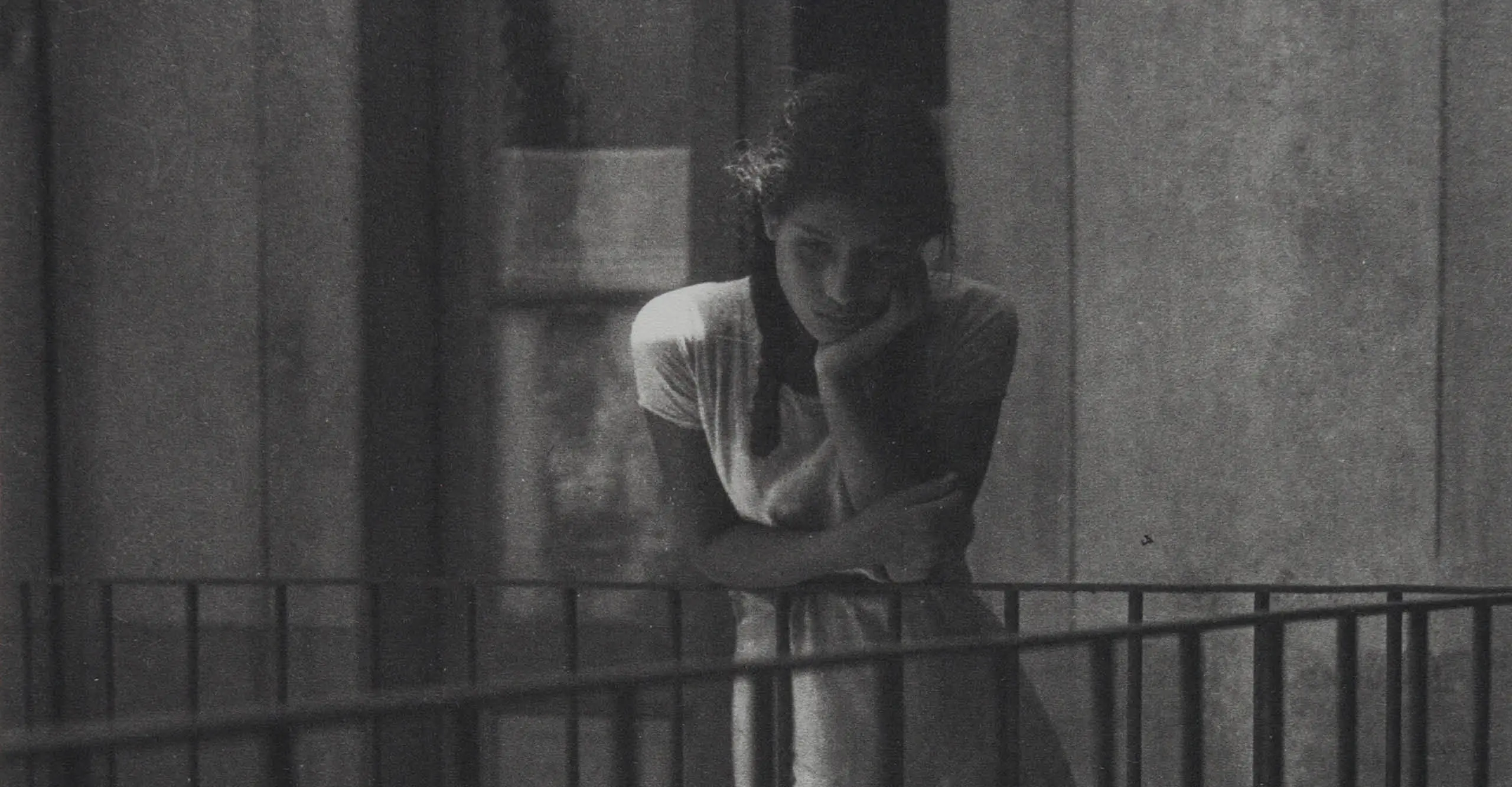 black and white photograph of a girl looking down, by manuel alvarez bravo at the photographers' gallery