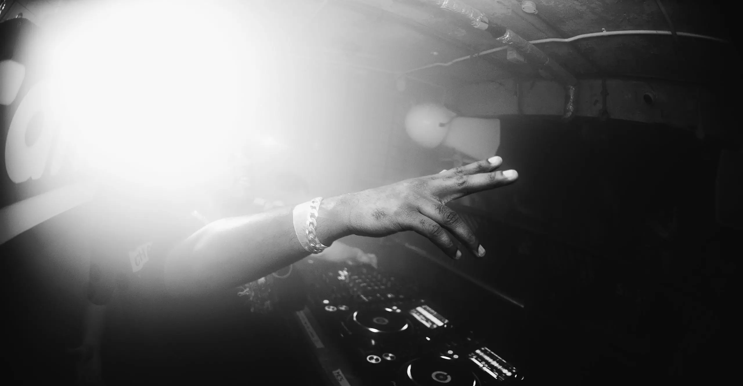 black and white image of DJ set. 