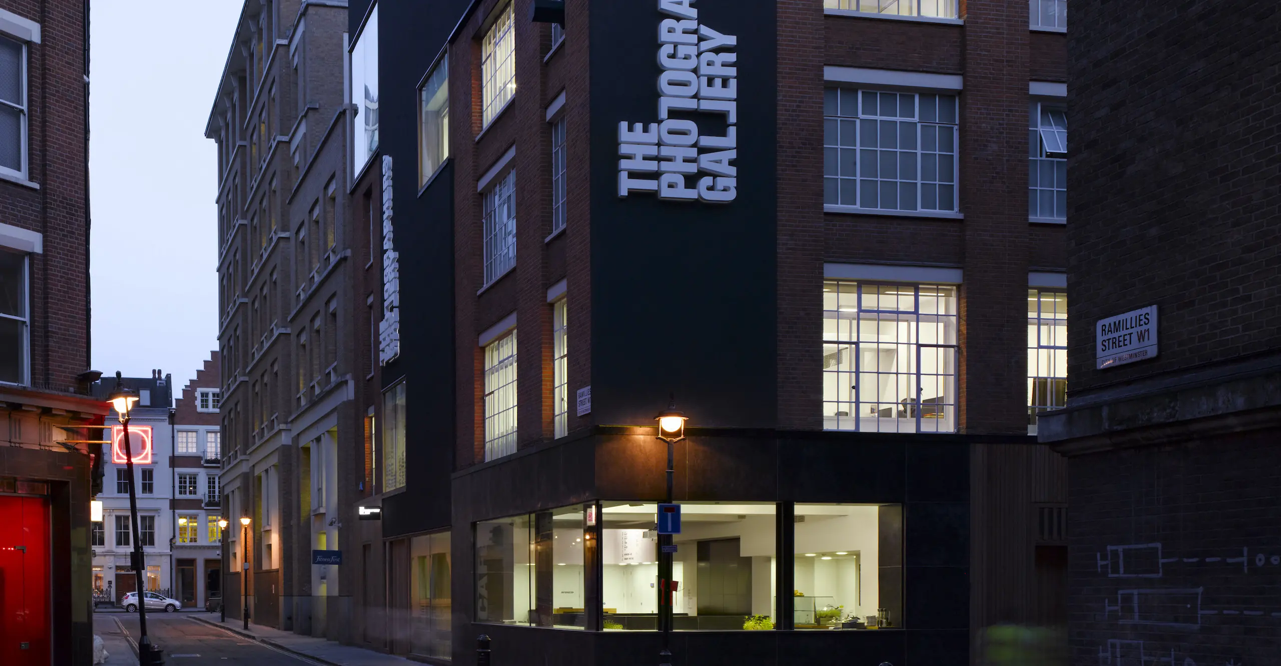 A photograph of the exterior of The Photographers' Gallery at dusk.