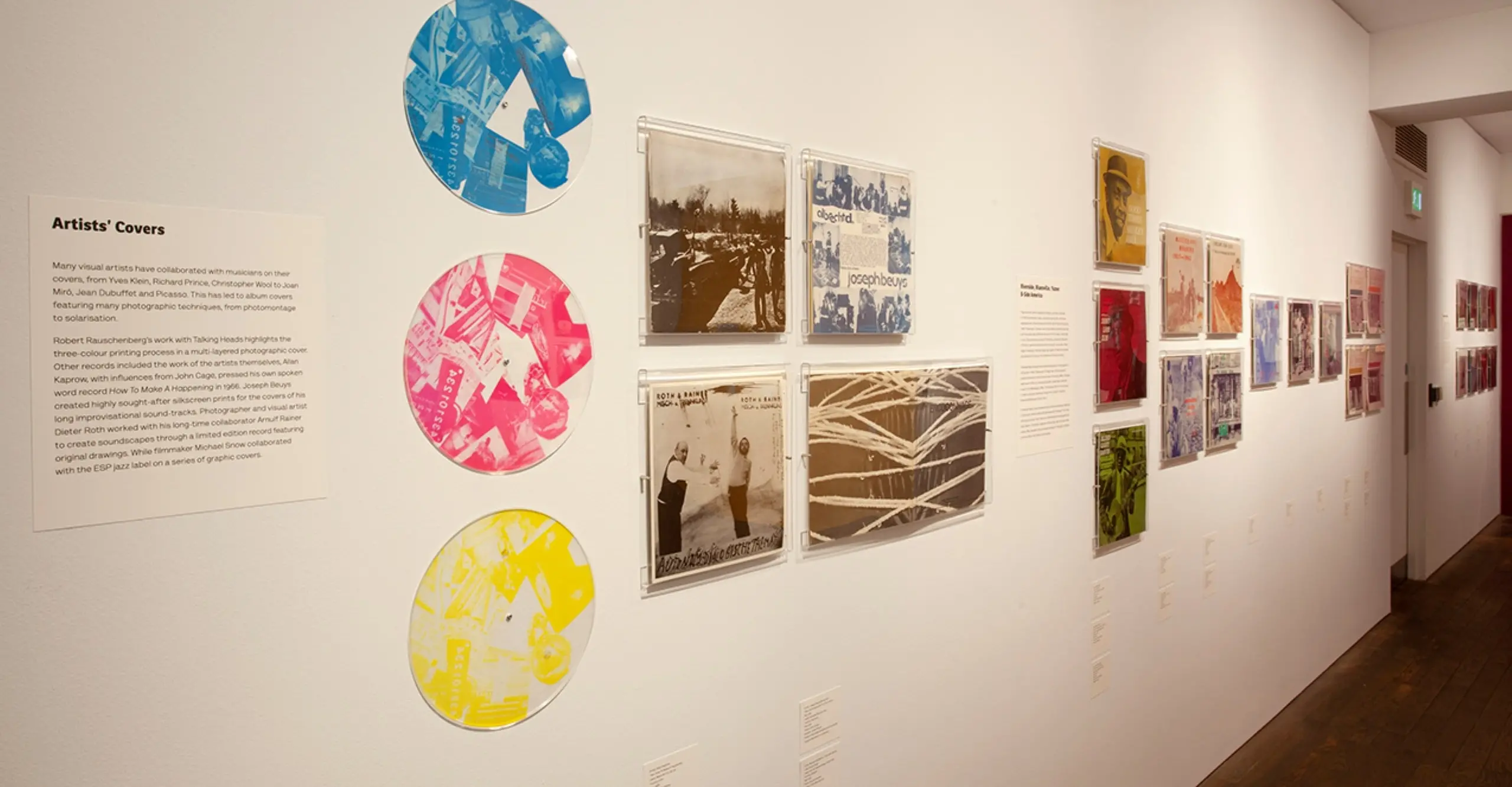 Image of exhibition wall, displaying vinyl