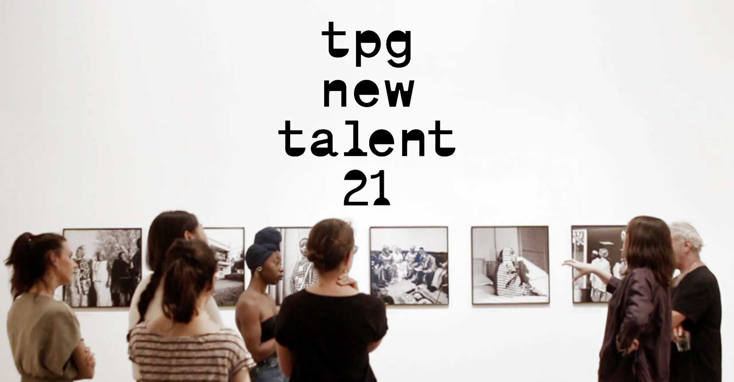 Young photographers are in conversation with Jim Goldberg. The words TPG New Talent '21 appear above them.