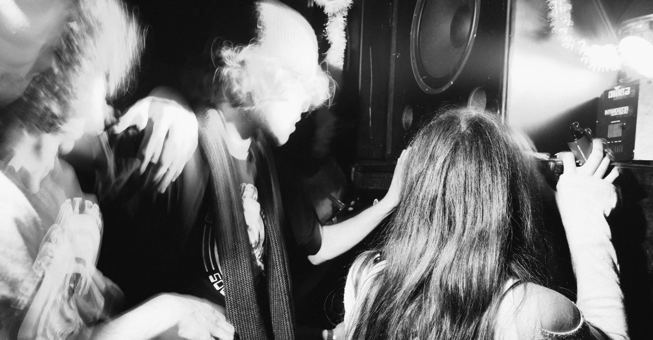 black and white photo of people dancing