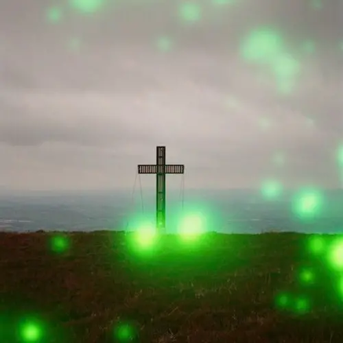 cross with green dots 