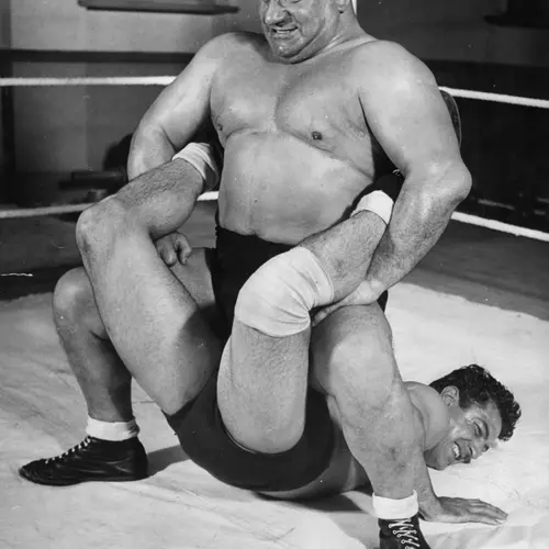 Black and white photograph of two wrestlers