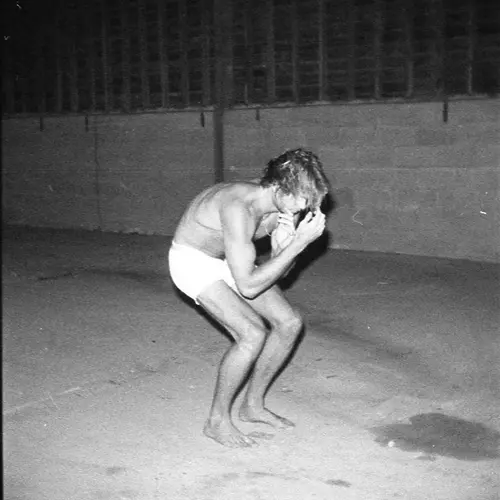 A black and white photograph of a person.