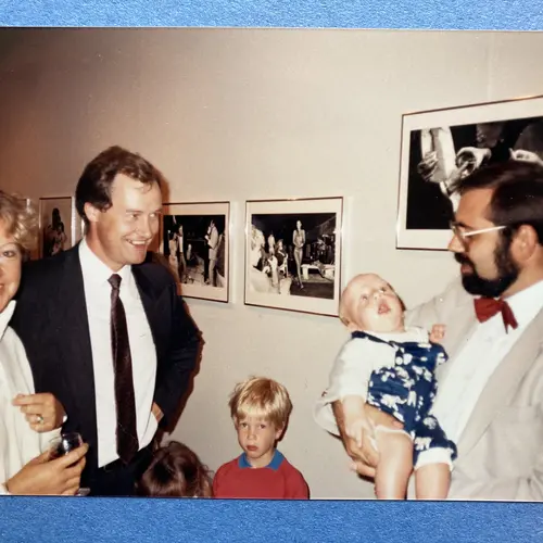Left, individuals included in the project attended the exhibition. Kate married to Jamie (right) with babe-in-arms. Second left: Peter, a new arrival from the Midlands. The names here are not their real names but the names they went under in the book. © Georgie Meadows
