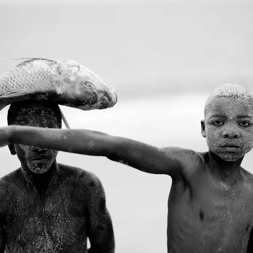 Two Boys with a Fish, from the series 'Faith'	2018	 © Mário Macilau / Courtesy of Ed Cross Fine Art
