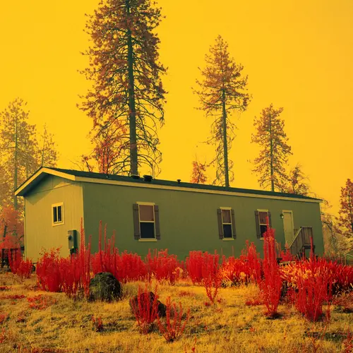 An American bugalow, yellow sky 