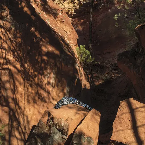 Image of large rock, with glitter in the centre
