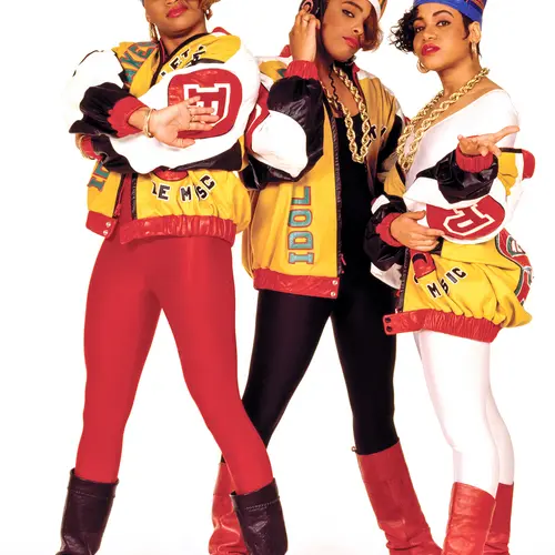 colour photograph of salt-n-pepa standing and posing for the camera