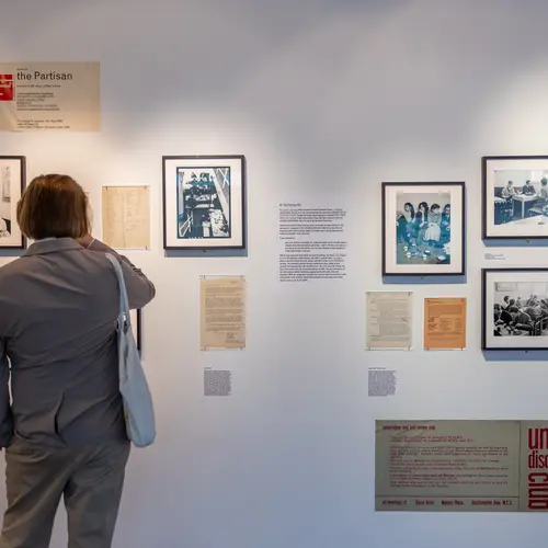 Image of a visitor at The photographers gallery exhibition the partisan coffee house