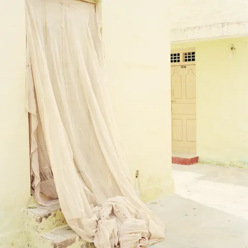 White building with curtain