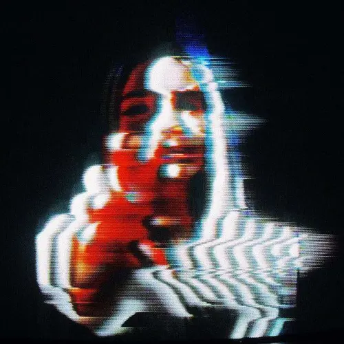 A glitchy TV screen capture with a person raising their hand toward the camera over a black background 