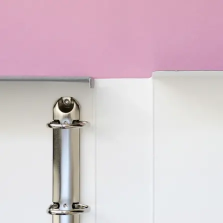 An open folder with a pink background.