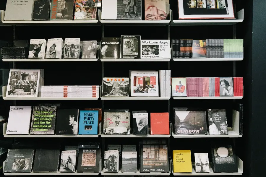 four shelves full of books