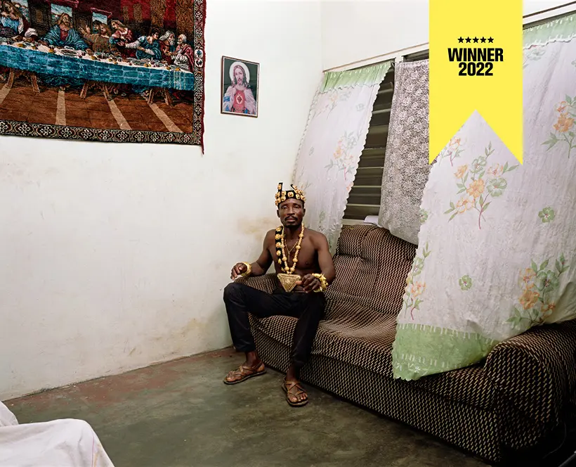 image of man sitting down by deana lawson at the photographers gallery