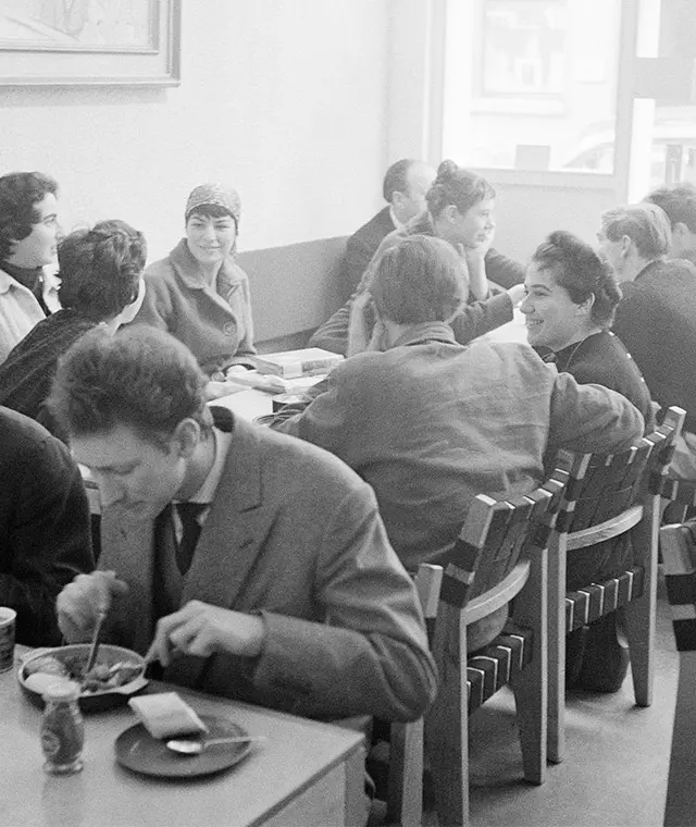 Image of patrons at the original Partisan Coffee House in Soho shown at The Photographers Gallery