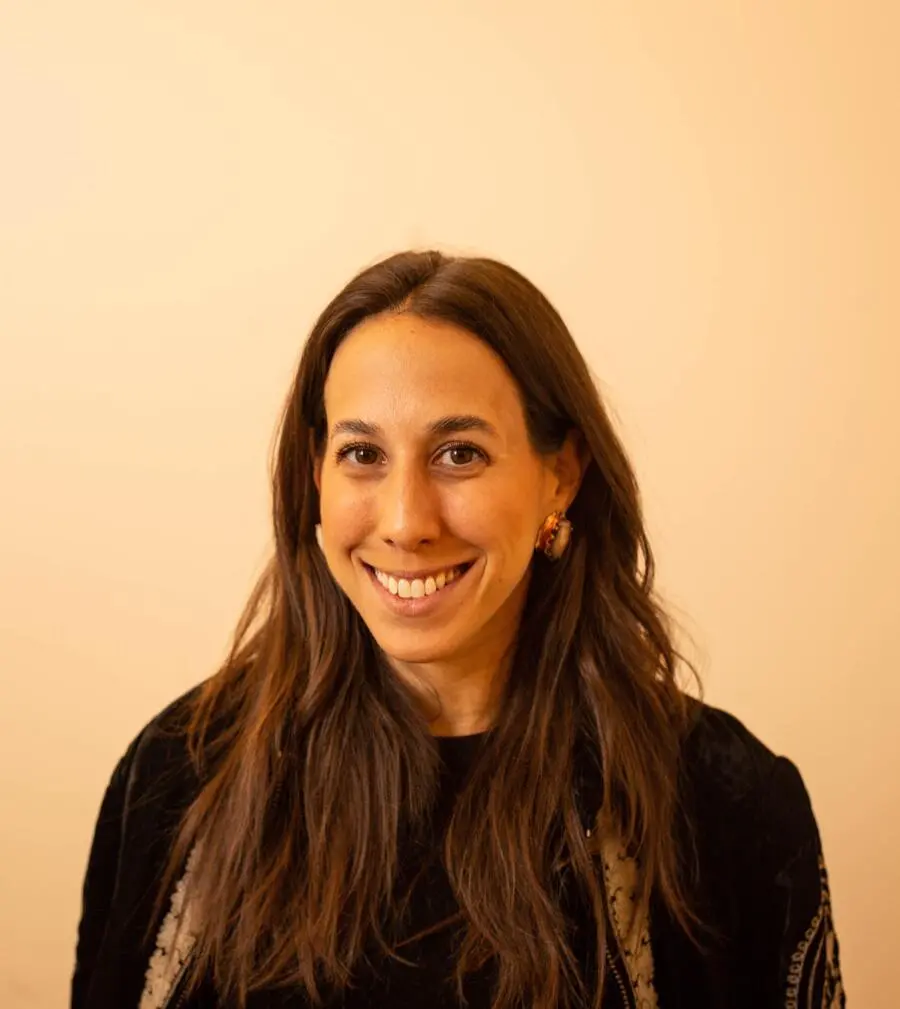 A portrait of a person smiling.