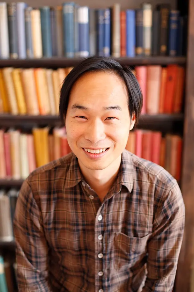 An image of Tung-Hui Hu. He is facing the camera and smiling.