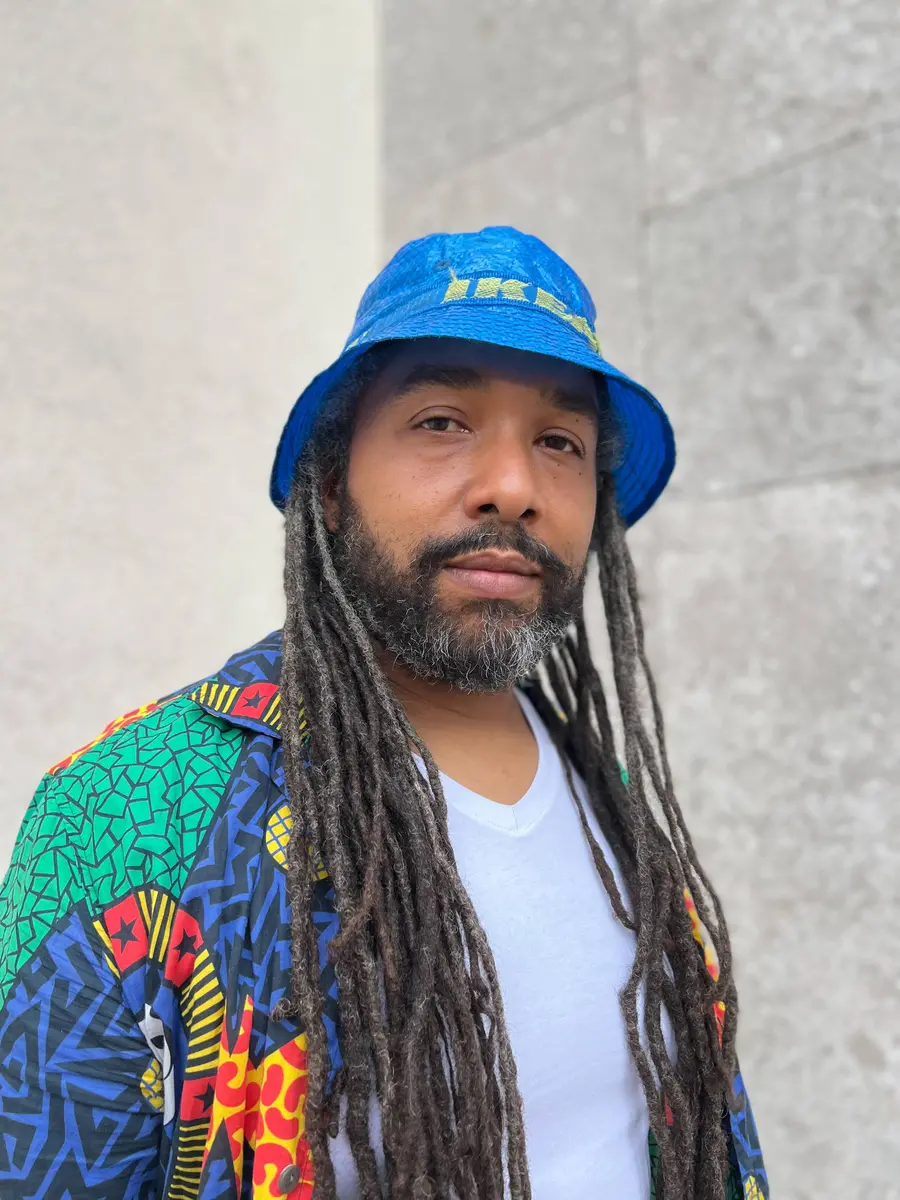 Photo portrait of Eddie Otchere. 