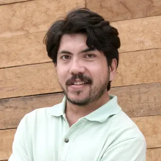 Colour photograph of a person showing head and shoulders 