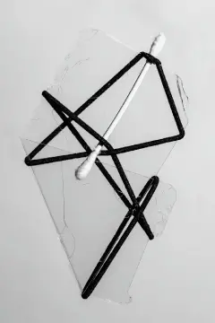 Colour photograph of abstract image with cotton buds and wire