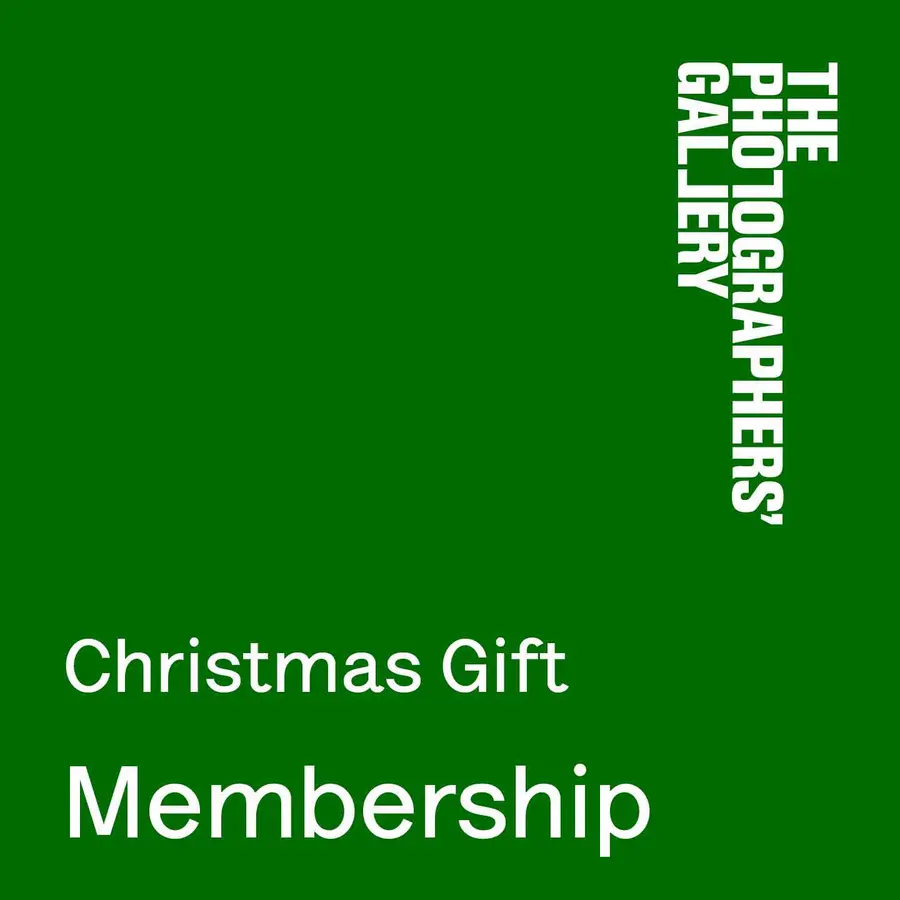 The words Christmas Gift Membership in white on a green background
