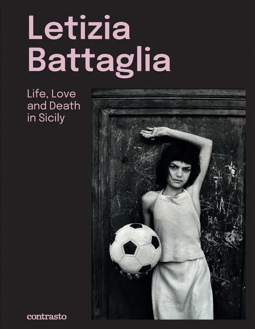 The cover of a the exhibition catalogue featuring the artists name as a title and an image a young girl leaning against a wall, holding a football.