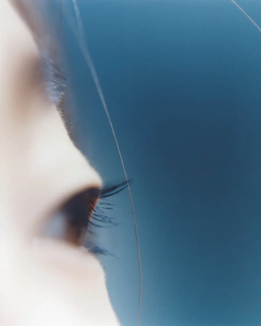 A close up of a person's eye from a side profile.