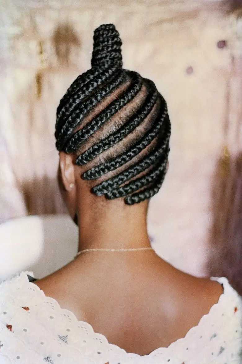 Photograph of the back of someone's braided head