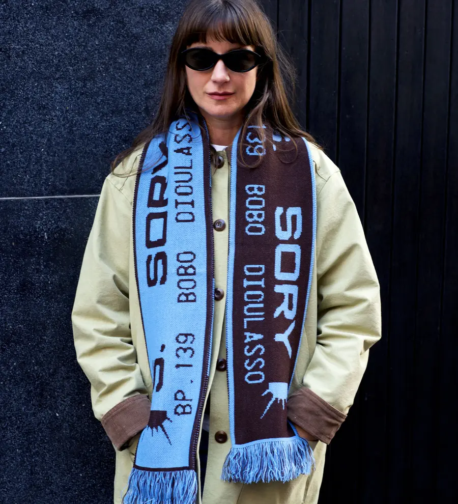 Image of someone wearing a colourful scarf inspired by Sanlé Sory