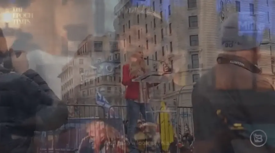 A blurred image of people overlapping buildings