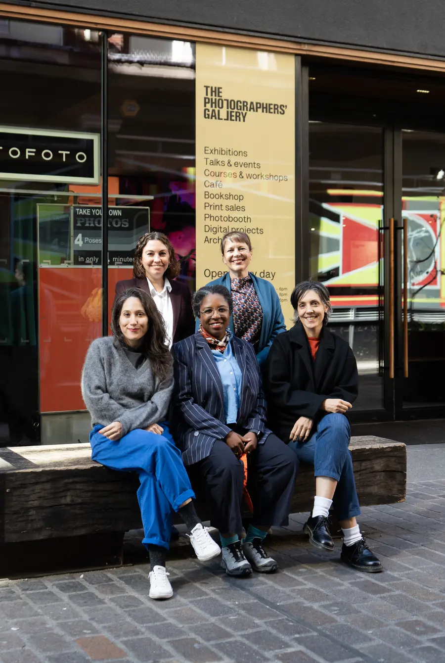 Jury group photo outside the entrance of The Photographers' Gallery
