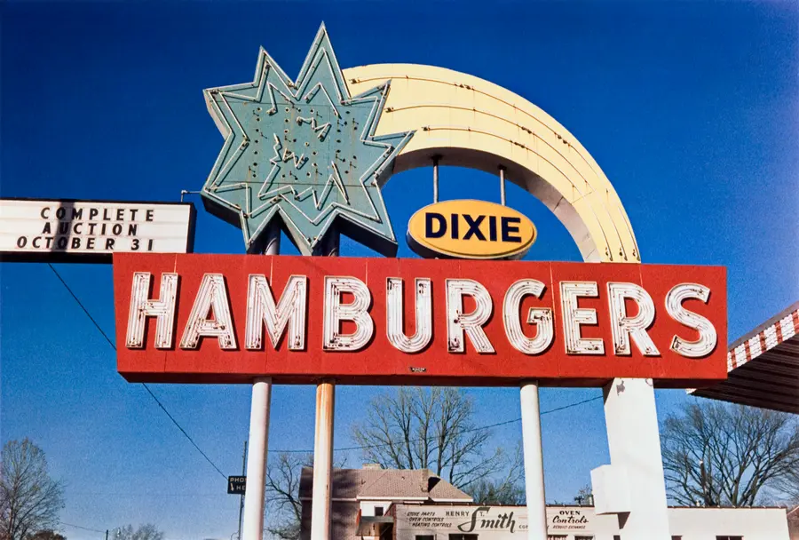 Colour photograph of a large sign saying ‘DIXIE HAMBURGERS’.