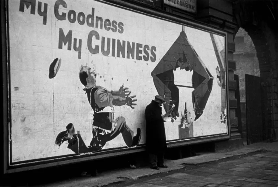 Black and white photo of a Guinnessadvert. The slogan reads: ‘My Goodness, My Guinness.’