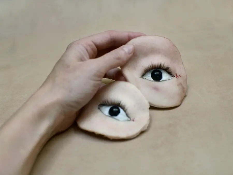 photograph of hand holding two eyes by Aneta Grzeszykowska, Selfie #10 at The Photographers’ Gallery, London