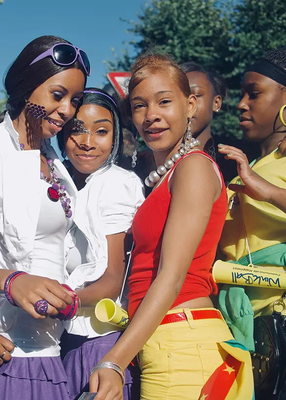 Group of young girls stood in the sunshine,