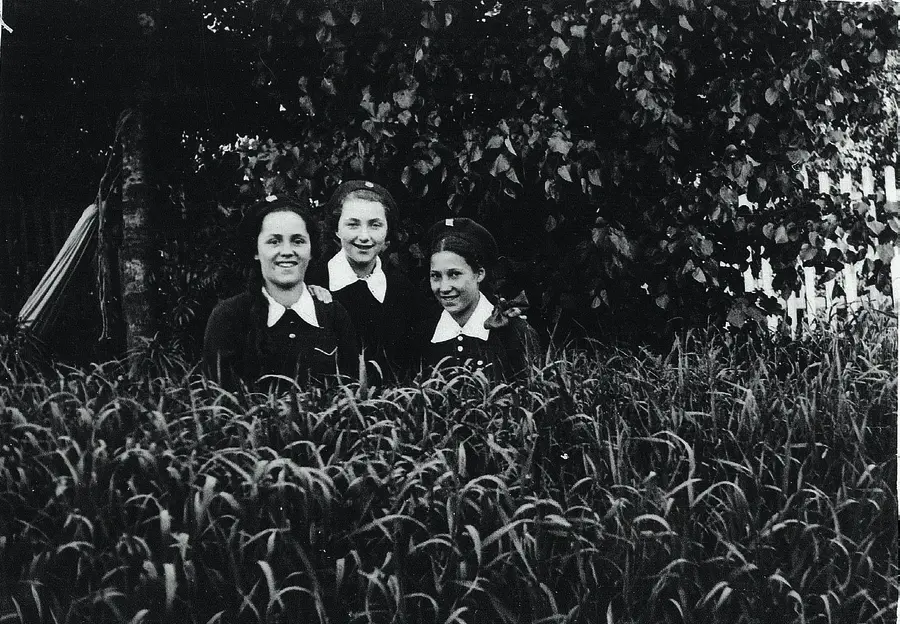 Roman Vishniac Tonia Kamieniecki and Tonia Delatycki with classmate in their new Soviet school uniforms, Novardok, ca. late 1939