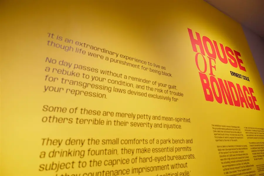 Colour photograph of the introduction text on the gallery wall to the exhibition Ernest Cole: House of Bondage
