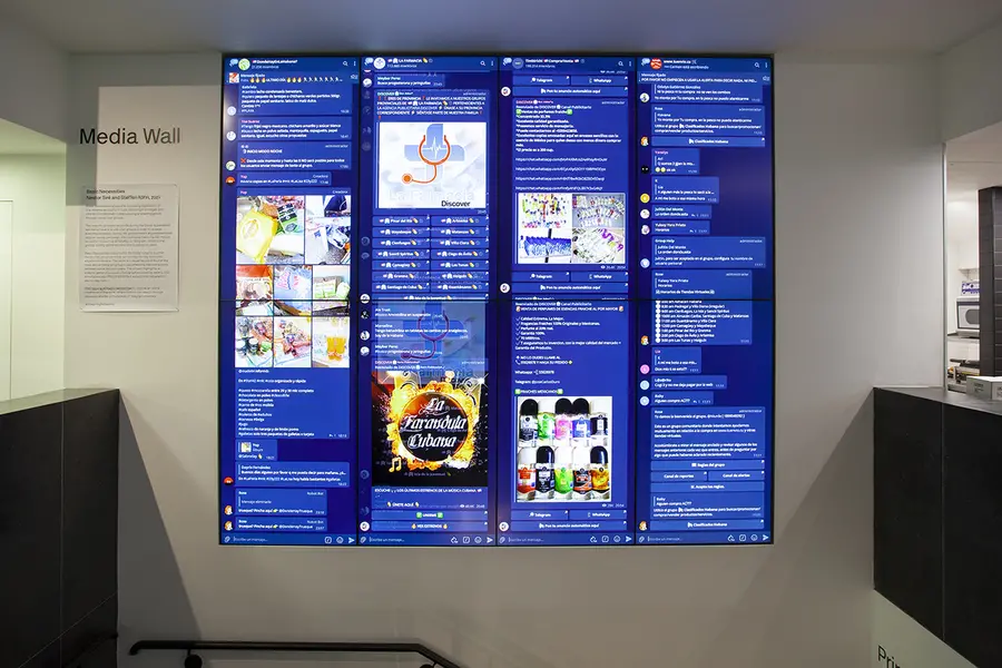 The Media Wall screens showing a screen capture of four Telegram channels offering a range of products for sale or exchange