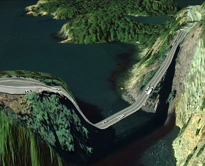 A stretched, low resolution view from a Google satellite of a road between two mountains, that curves unsupported over the sea