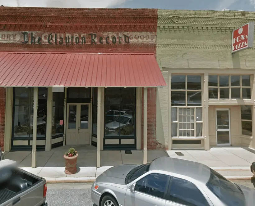 A screenshot of a view from Google Street View of the façades of various local businesses 