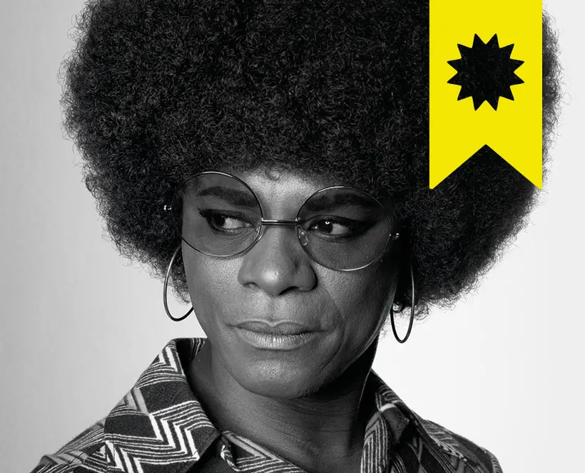 Black & white image of samuel fosso dressed up as American activist Angela Davis